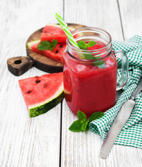 Jars with watermelon smoothie