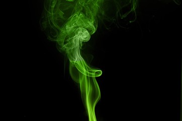 Green colored smoke on a black background, abstract cloud. Smoke design,Abstract green lighting,Green Smoke