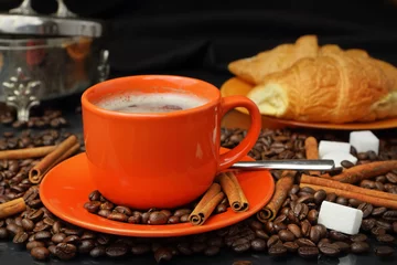 Fotobehang Still life with an orange mug in coffee grains © parsadanov