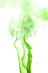 Plakat green smoke on a white background,Abstract green smoke swirls over white background, fire smoke