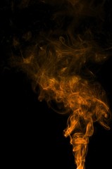 Abstract color smoke on black background, orange smoke background,orange ink background,orange...