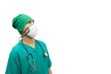 Handsome man doctor in green gown with stethoscope thinking while looking up,isolated on white in studio with copy space