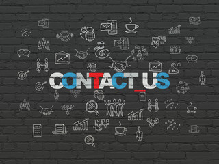 Business concept: Contact us on wall background