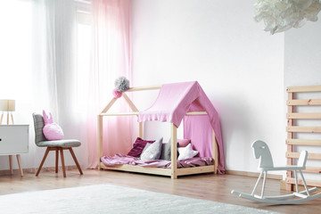 Girls bedroom with rocking horse © Photographee.eu