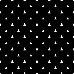Seamless pattern with small white triangles on a black background. Basic geometric background