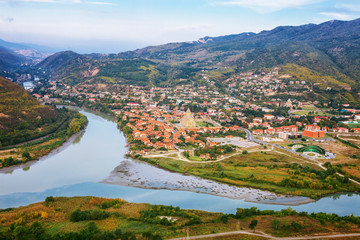 Fototapeta na wymiar The Top View Of Mtskheta, Georgia, The Old Town Lies At The Confluence Of The Rivers Mtkvari And Aragvi