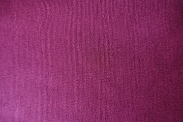 Reddish violet plain stockinet fabric from above