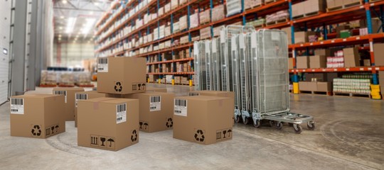 Composite image of group of graphic cardboard boxes