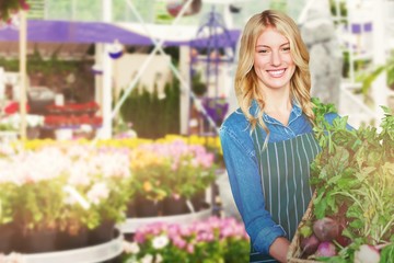 Composite image of portrait of young woman holding vegetables in