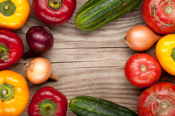 vegetables crop background onions garlic tomatoes, pepper, cucumber. top view