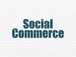 Marketing concept: Social Commerce on wall background