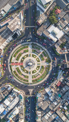 Aerial view, Road roundabout, Expressway with car lots in the city in Thailand.  beautiful Street , downtown, cityscape, Top view. Background