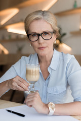 mature woman drinking coffee