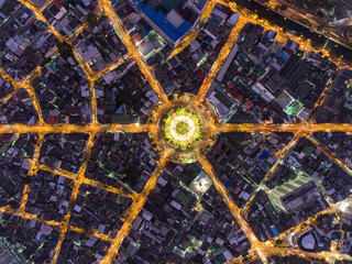 Aerial view, Road roundabout, Expressway with car lots in the city in Thailand.  beautiful Street , downtown, cityscape, Top view. Background road.