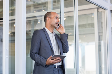 Businessman talking on phone