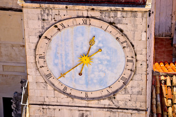 Town of Trogir main square clock tower closeup view