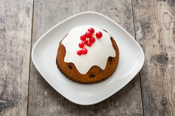 Christmas pudding on wooden table

