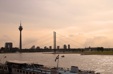 Fototapeta na wymiar Dusseldorf skyline from the Rhine river with Rheinkniebrucke and television tower