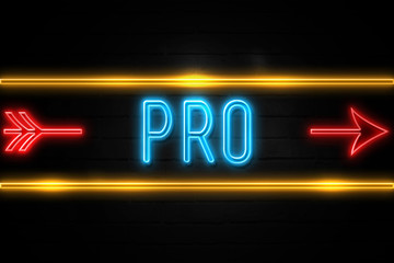 Obraz premium Pro - fluorescent Neon Sign on brickwall Front view