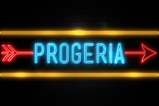 Progeria  - fluorescent Neon Sign on brickwall Front view