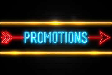 Promotions  - fluorescent Neon Sign on brickwall Front view