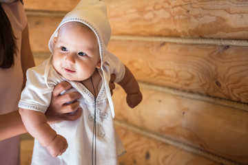 Portrait of a happy child during baptism