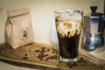 coffee serve in set on wooden plate 
