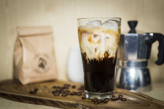 coffee serve in set on wooden plate 
