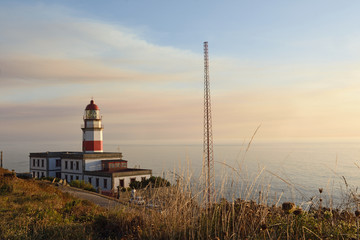 Sunset at lighthouse of Cape Sillerio, Pontevedra province, Galia, Spain