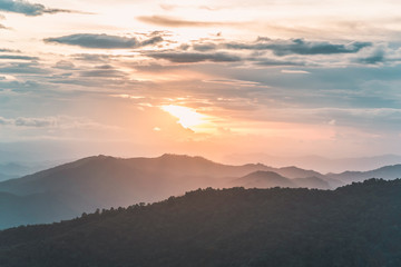 High mountains and clouds at sunset 