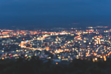 Blur background city lights at night and blue sky