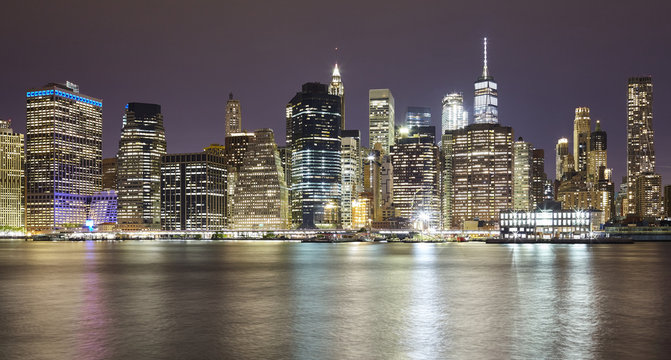 Panoramic picture of Manhattan at night, New York City, USA.
