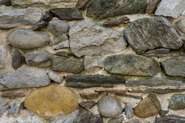 old historic stone wall structure with different colours close up