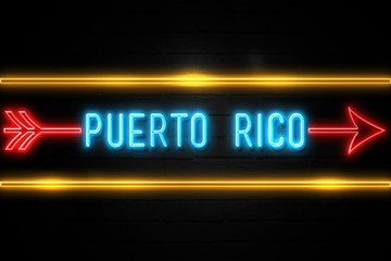 Obraz premium Puerto Rico - fluorescent Neon Sign on brickwall Front view