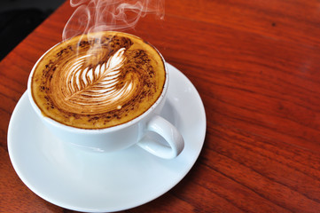 white cup of hot coffee