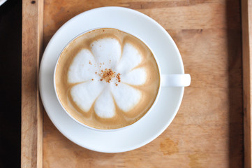 Coffee cup in coffee shop,Cup of coffee on a wooden table,cup of coffee on table in cafe,cup of cappuccino