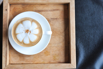 Coffee cup in coffee shop,Cup of coffee on a wooden table,cup of coffee on table in cafe,cup of cappuccino