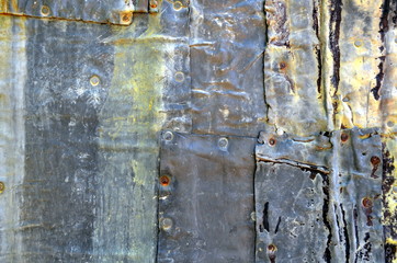 Metall-Hintergrund mit Nähten