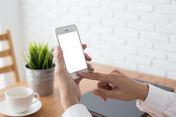 Hand young woman holding mobile smart phone with blank screen,Female using smart phone  in cafe