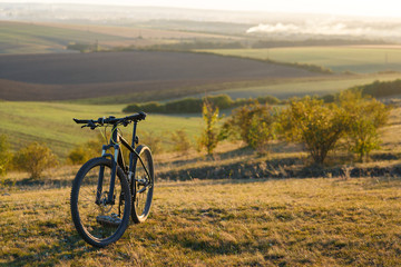 Obraz premium Sunrise, sunset, Cycling around the world Is a journey to freedom.