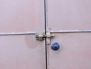 Closed metal door with safety lock