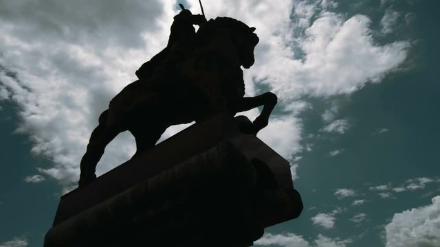 Knight on a horse statue silhouette timelapse