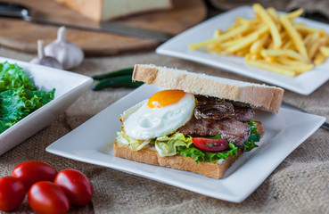 Sandwich with meat for breakfast