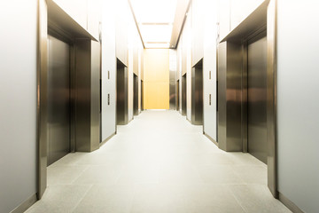modern steel elevator cabins in a business lobby or Hotel, Store, interior, office,perspective wide angle..