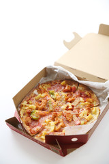 pizza , chicken green pepper pineapple in box isolated in white background