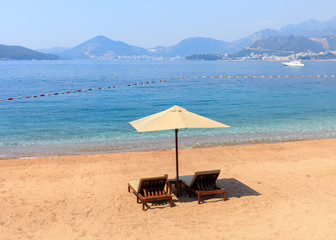 Sunbeds with seaview on the luxury sandy beach in Montenegro