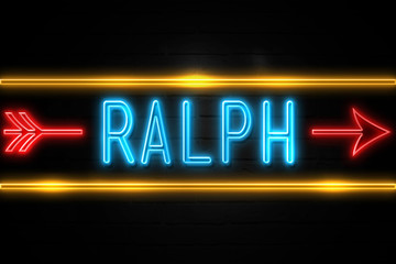 Fototapeta na wymiar Ralph - fluorescent Neon Sign on brickwall Front view