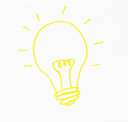 hand drawn shining yellow light bulb isolated on white background.
