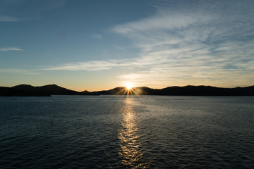 Sunrise entering Queen Charlotte Sound, New Zealand