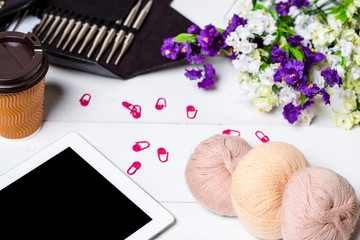 A tangle of Italian angora to knit a bright scarf for a cold day, knitting to make a meaningful present. Soft Knits from rabbit